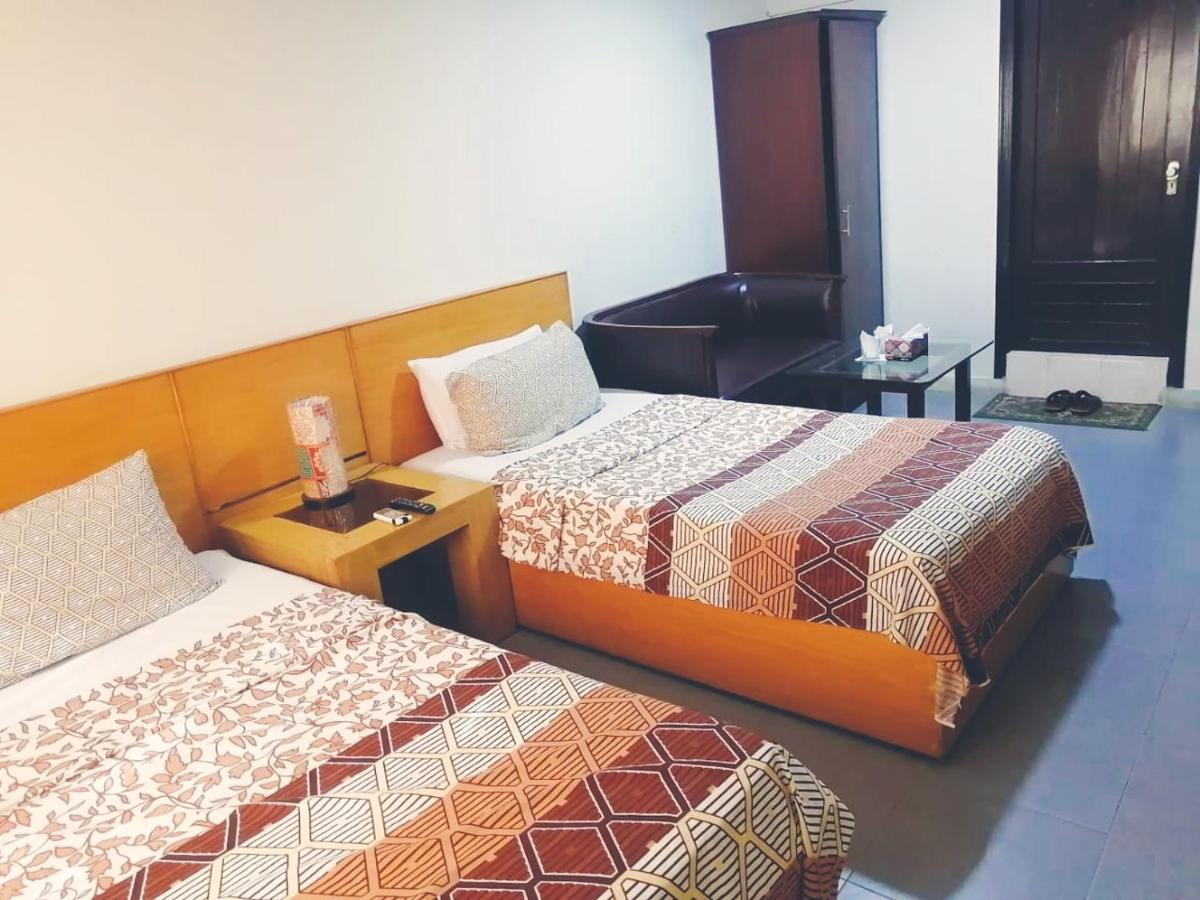 Hotel Rooms Dha Karachi Habitación foto