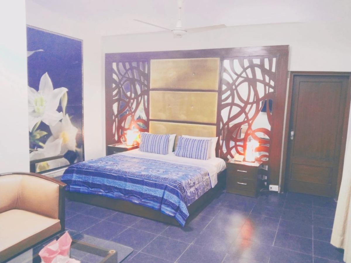 Hotel Rooms Dha Karachi Habitación foto